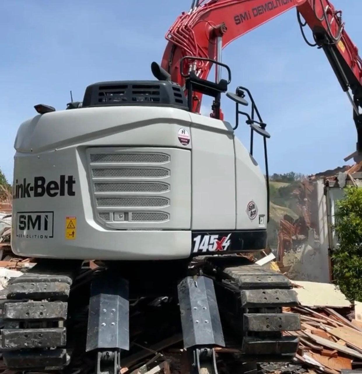 Excavator Down — Structure Demolition